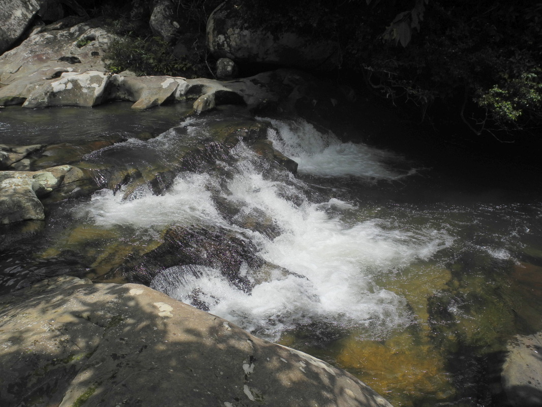 The river at the top of the falls with Backyard Tour Malaysia