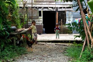 2 kids welcoming us back to the village with Backyard Tour Malaysia