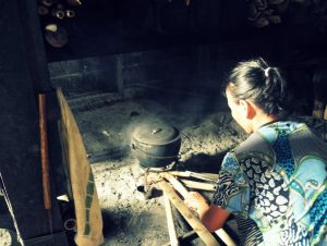 Cooking at traditional fireplace, in Kampung Kiding with Backyard Tour Malaysia
