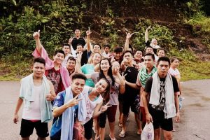 A group of local students on their way to the waterfall with Backyard Tour Malaysia