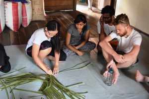 A group of student learning how to weave with Backyard Tour Malaysia