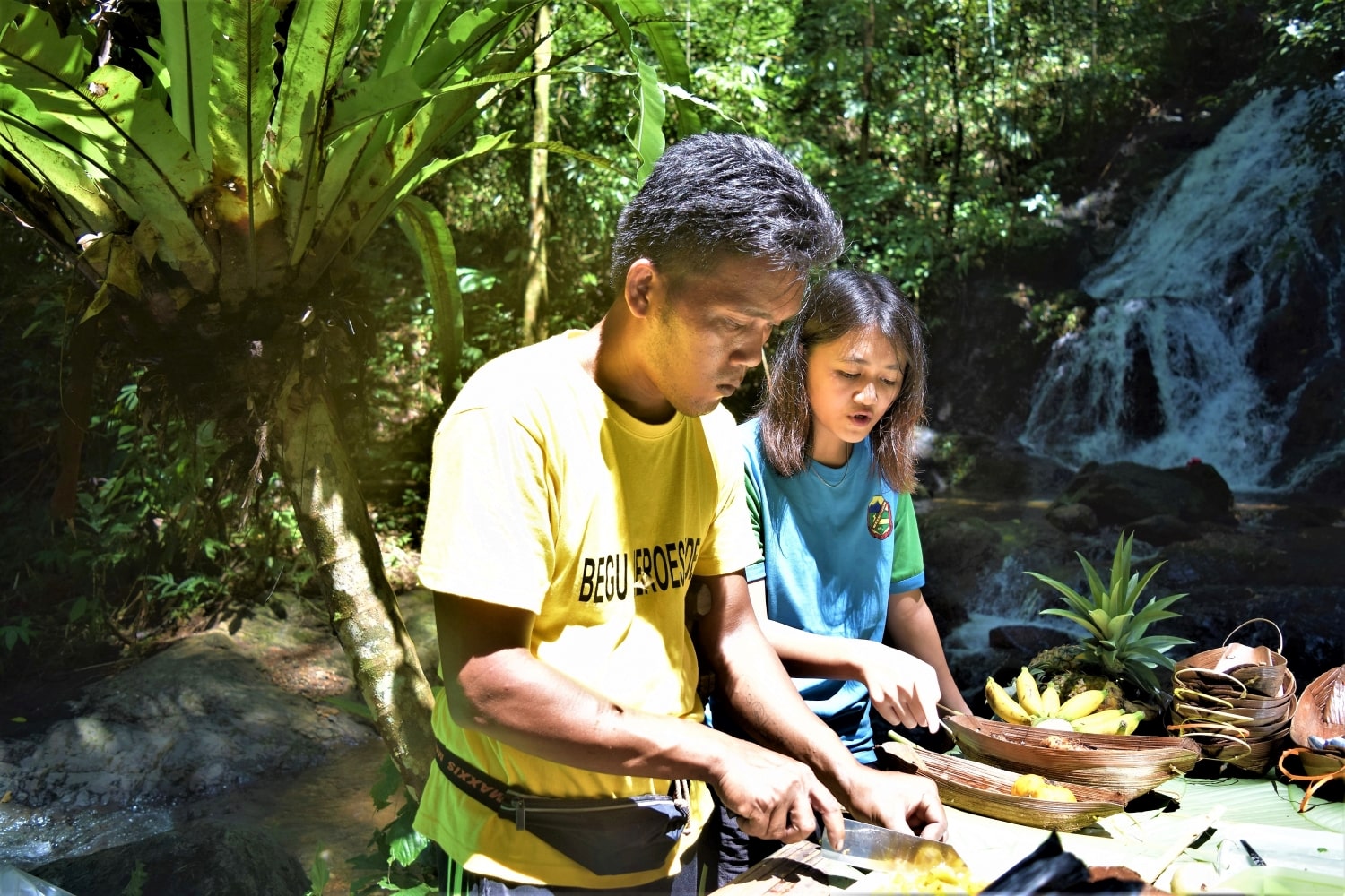 Cooking tribal food lunch at the waterfall in Begu Village, Kuching with Backyard Tour Malaysia
